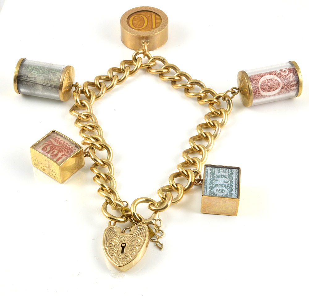 9ct gold solid charm bracelet with 5x charms